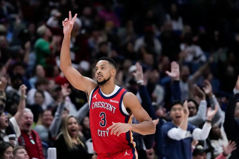 New Orleans Pelicans guard CJ McCollum (3) reacts after making a 3-pointer in the second half Dec. 11 against the Minnesota Timberwolves in New Orleans.