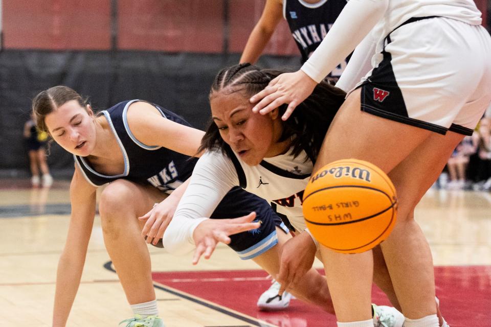 West Panthers forward/center Jerzy Tapusoa (12) falls after fighting for the ball during a game against the Salem Hills Skyhawks at West High School in Salt Lake City on Thursday, Feb. 22, 2024. | Marielle Scott, Deseret News