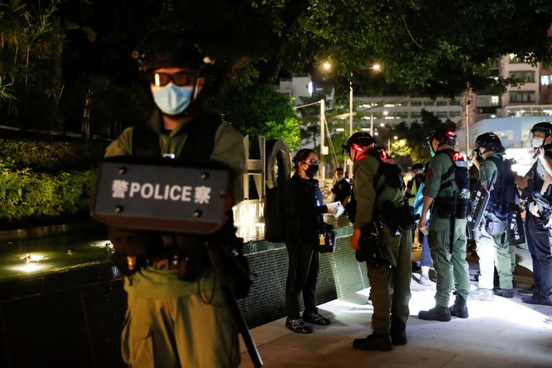 Protest to mark the first anniversary of an attack in a train station by an armed crowd wearing white shirts, demanding justice for the victims of violence and broader freedoms, at a shopping mall in Hong Kong's Yuen Long