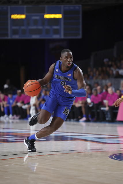 In a photo provided by Bahamas Visual Services, Memphis' David Jones drives during the first half of the team's NCAA college basketball game against Michigan in the Battle 4 Atlantis at Paradise Island, Bahamas, Wednesday, Nov. 22, 2023. (Tim Aylen/Bahamas Visual Services via AP)