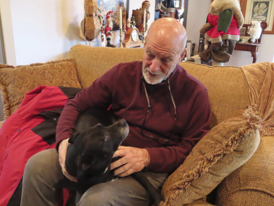 Stewart Farrell is photographed at his home in Port Republic, N.J., on Tuesday, Dec. 27, 2022. Farrell is retiring on Dec. 30, after more than 50 years as one of the nation's leading coastal scientists, whose expertise on the ever-changing shoreline has informed governments, property owners and other scientists. (AP Photo/Wayne Parry)