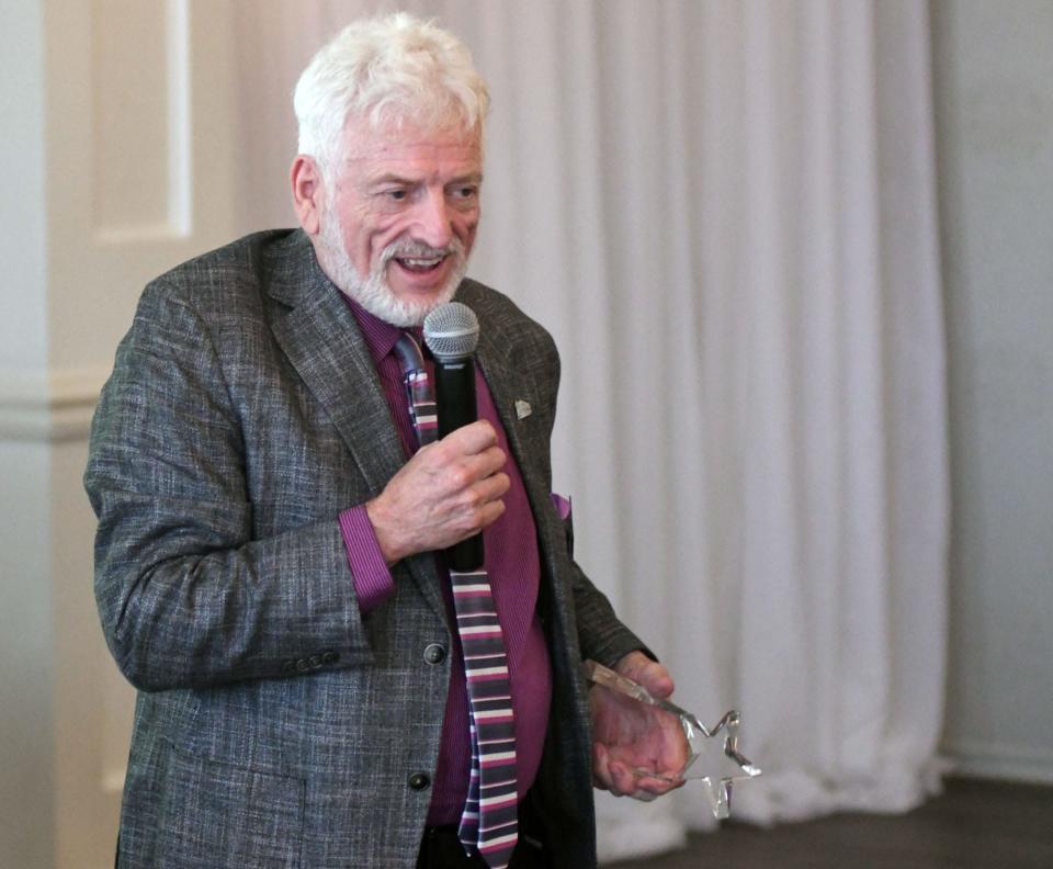 StarNews Media Lifetime Achievement Award honoree Tony Rivenbark speaks at the StarNews Media Lifetime Achievement Awards luncheon at the Terraces at Sir Tyler in Wilmington, N.C, Tuesday in 2019.