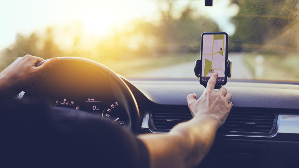 <p>No GPS, Apple Carplay or Android Auto in your cheap car? No problem. A phone mount allows you to easily see your phone and use its map apps to get around. You can find phone mounts that attach to your dashboard or air vent for under $15.</p>