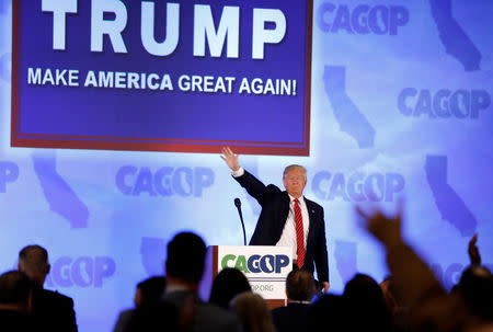 Republican U.S. presidential candidate Donald Trump waves after speaking to the California GOP convention in Burlingame, California April 29, 2016. REUTERS/Stephen Lam