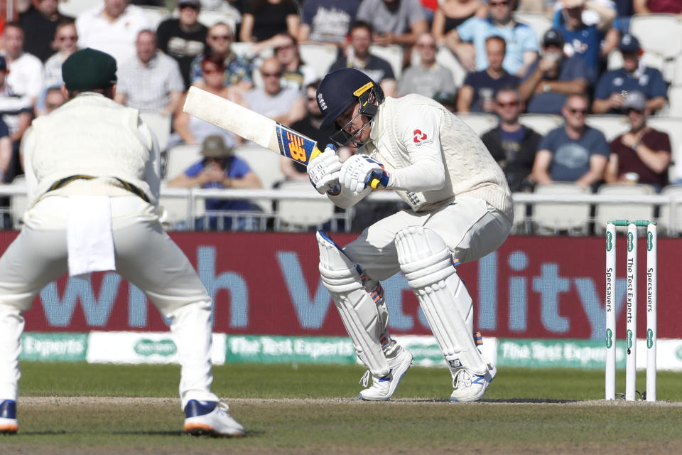 England's Jason Roy avoids a high ball during day five of the fourth Ashes Test cricket match between England and Australia at Old Trafford in Manchester, England, Sunday Sept. 8, 2019. (AP Photo/Rui Vieira)