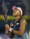 Naomi Osaka, of Japan, reacts during her match against Kristina Mladenovic, of France, at the Dubai Duty Free Tennis Championship in Dubai, United Arab Emirates, Tuesday, Feb. 19, 2019. (AP Photo/Kamran Jebreili)