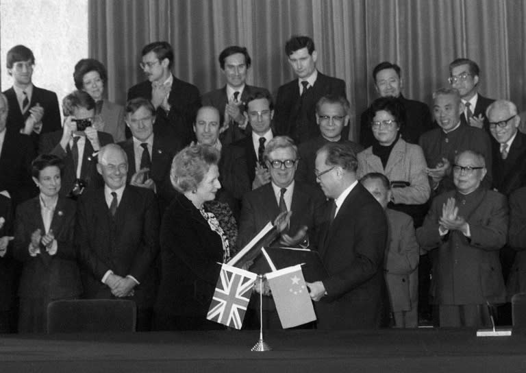 In December 1984, Chinese Premier Zhao Ziyang (front R) and British Prime Minister Margaret Thatcher (front L) met in Beijing for the ceremony formally committing the planned handover of Hong Kong from British to Chinese rule in 1997