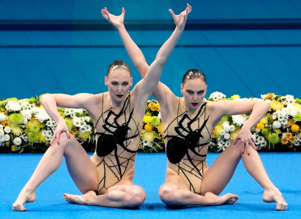 Svetlana Kolesnichenko and Svetlana Romashina (ROC) in the artistic swimming women's duet final on Wednesday, Aug. 4, 2021, during the Tokyo 2020 Olympic Summer Games at Tokyo Aquatics Centre. 