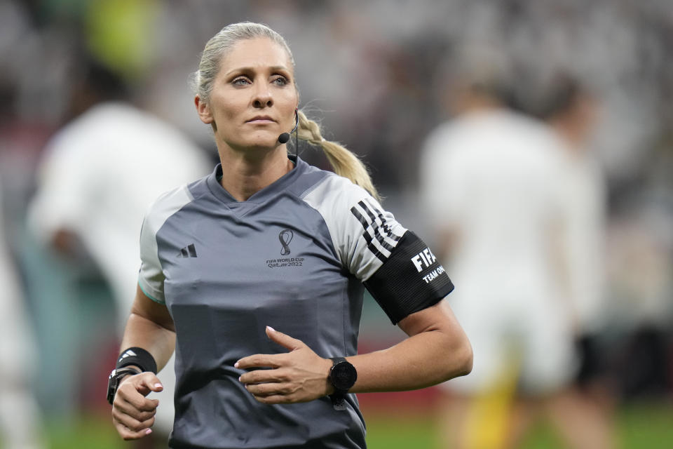 FILE - Referee assistant Neuza Back warms up prior to the World Cup group E soccer match at the Al Bayt Stadium in Al Khor, Qatar, Dec.1, 2022. Women match officials were appointed to work the Copa America for the first time on Friday, May 24, 2024. (AP Photo/Moises Castillo, File)