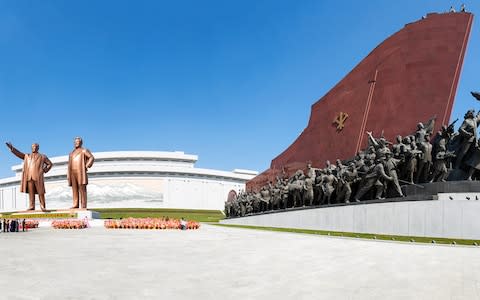 Statues of Kim Il-Sung and Kim Jong-il - Credit: GETTY
