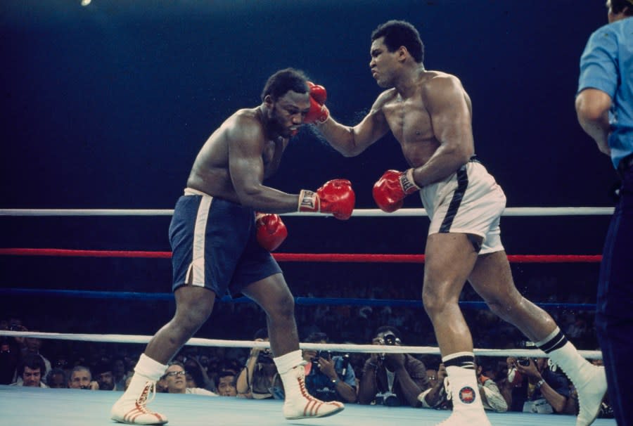 Heavyweight boxers Muhammad Ali (white shorts, 1942 – 2016) and Joe Frazier (1944 – 2011) in action during their championship bout in Quezon City, Manila, Philippines, October 1st 1975. (Photo by UPI/Bettmann/Getty Images)