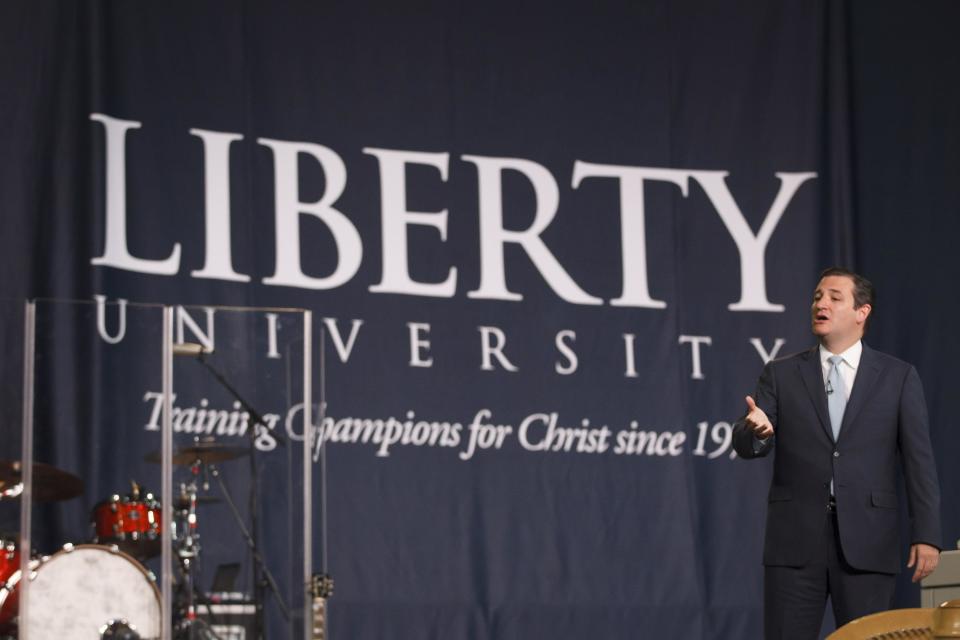 In this image provided by Liberty University, Sen. Ted Cruz, R-Texas., speaks in the Convocation Center at Liberty University in Lynchburg, Va., Wednesday, April 2, 2014. Cruz said Wednesday that religious Americans have a duty to take a stand against policies, such as President Barack Obama's health care law, that could threaten their liberties. (AP Photo /Liberty University,Ty Hester)