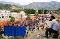 Hondurans take part in a new caravan of migrants, set to head to the United States, in Vado Hondo