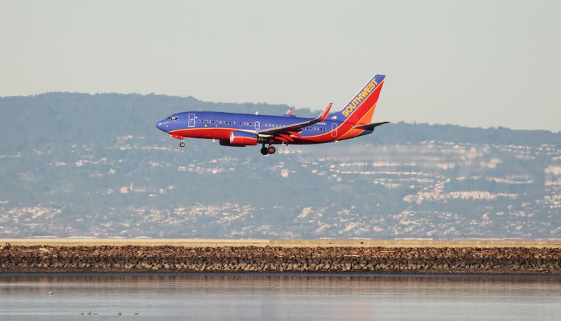 FILE PHOTO: A Southwest Airlines Boeing plane lands at San Francisco International Airport, San Francisco