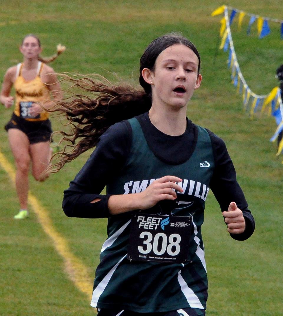 Smithville's Maryn Erdman, pictured here during the cross country season, has started the track season strong with a school record run in the 800.