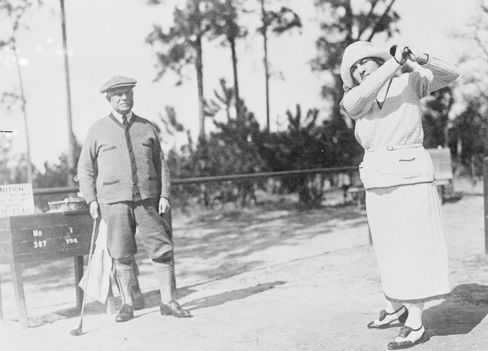 Daniel and Florence Guggenheim playing golf in 1922.