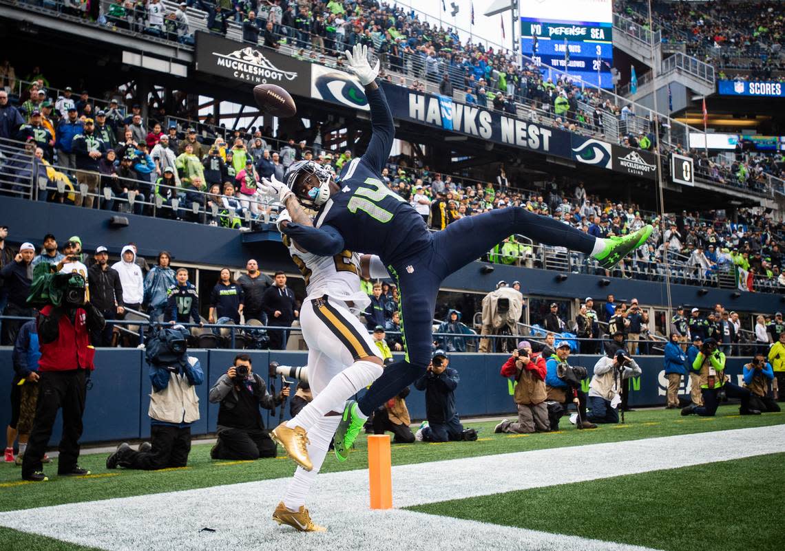 Seattle Seahawks wide receiver D.K. Metcalf (14) can’t pull in a late touchdown grab as he’s defended by New Orleans Saints cornerback Marshon Lattimore (23). The Seattle Seahawks played the New Orleans Saints in a NFL football game at CenturyLink Field in Seattle, Wash., on Sunday, Sept. 22, 2019.