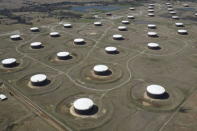 Crude oil storage tanks are seen from above at the Cushing oil hub, in Cushing, Oklahoma, March 24, 2016. REUTERS/Nick Oxford