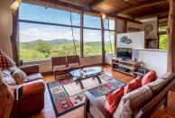 <p>The home overlooks a low valley, which makes it perfect for spotting rare birds and monkeys. (Airbnb) </p>