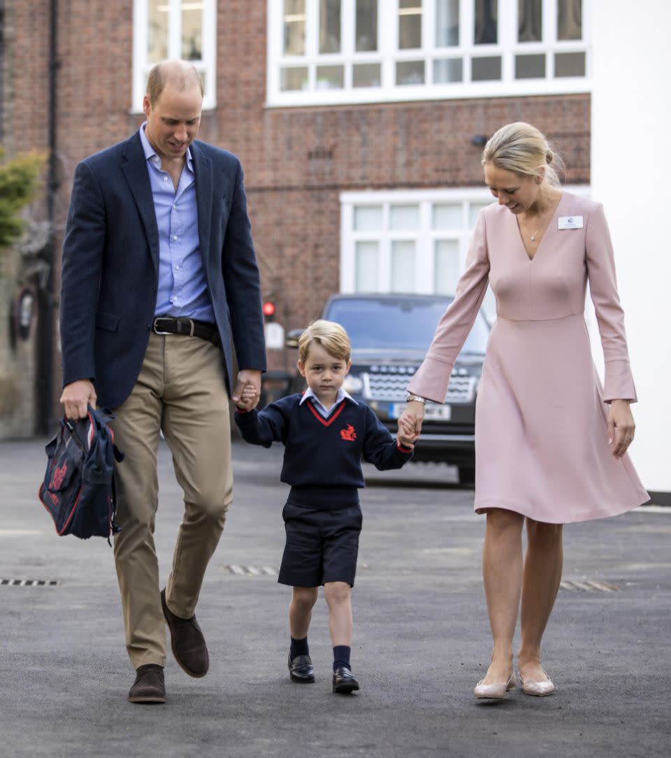 Prince George held his father Prince William's hand as he made his way to his first day of school. Photo: Getty Images