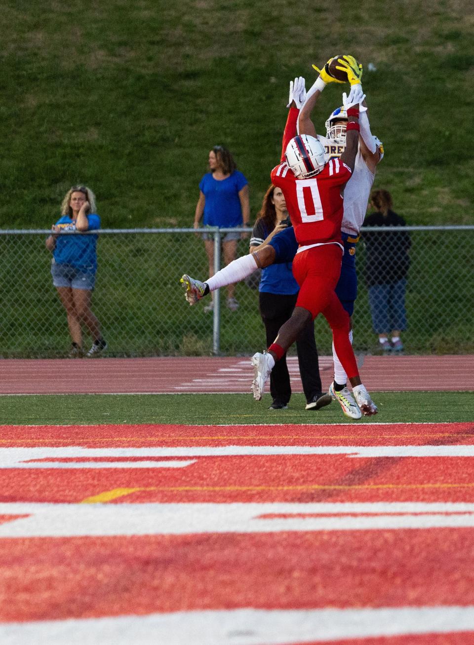 Orem scores a touchdown during the third quarter of their high school football season opener against East at East High School in Salt Lake City on Friday, Aug. 11, 2023. | MEGAN NIELSEN, Megan Nielsen, Deseret News