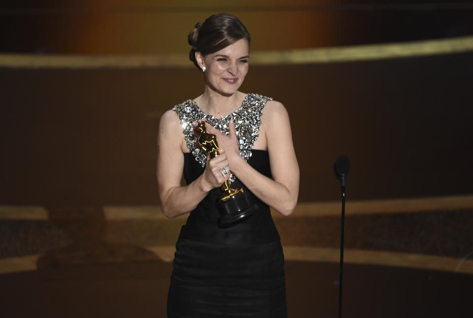 Hildur Guonadottir accepts the award for best original score for "Joker" at the Oscars on Sunday, Feb. 9, 2020, at the Dolby Theatre in Los Angeles. (AP Photo/Chris Pizzello)