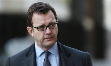 Former News of the World editor Andy Coulson arrives at the Old Bailey courthouse in London January 28, 2014. REUTERS/Suzanne Plunkett