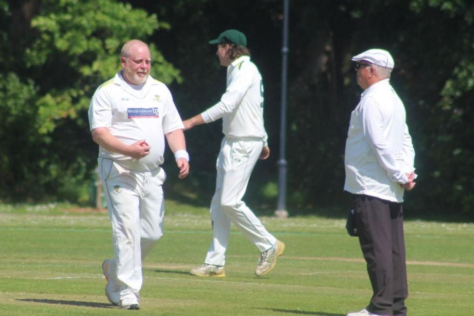 Dean Rogerson, left, was the pick of Bere's bowlers with 3-36 <i>(Image: BARCUD-COCH PHOTOGRAPHY)</i>