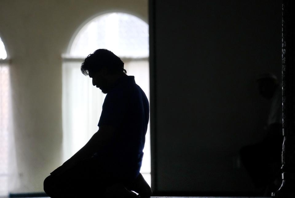 A congregant prays during a Wednesday afternoon service at the Islamic Community Center of Tempe on March 6, 2024.