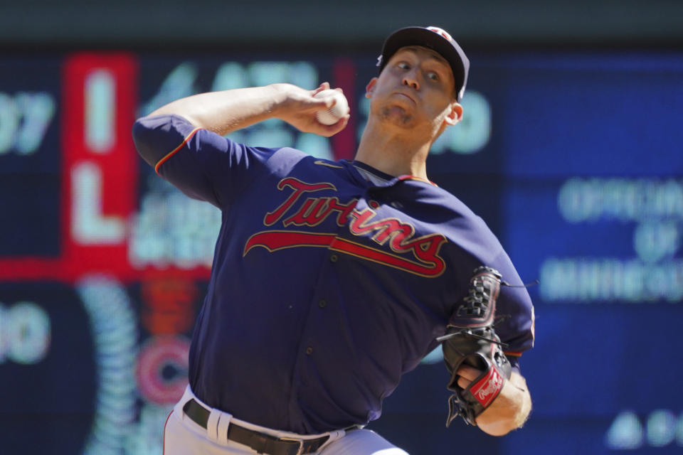 Minnesota Twins pitcher Josh Winder throws against the Cleveland Guardians in the first inning of a baseball game, Sunday, Sept 11, 2022, in Minneapolis. (AP Photo/Jim Mone)