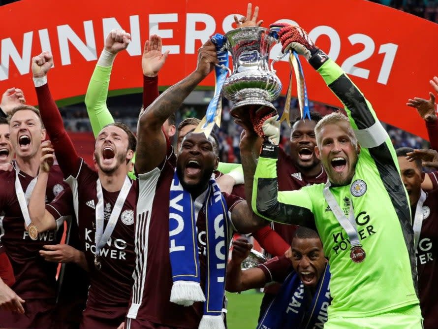 <p>Leicester lift the trophy at Wembley</p> (POOL/AFP via Getty Images)