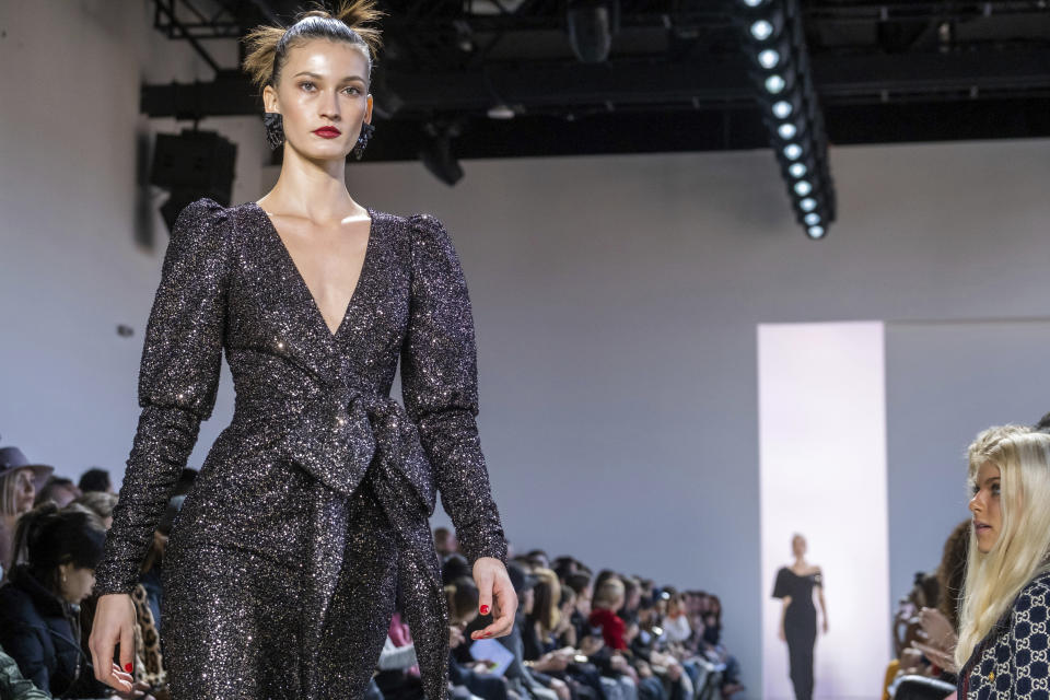 The Badgley Mischka collection is modeled at Spring Studios during NYFW Fall/Winter 2020 on Saturday, Feb. 8, 2020, in New York. (Photo by Charles Sykes/Invision/AP)