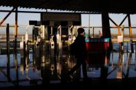 Traveller walks at Beijing Capital International Airport