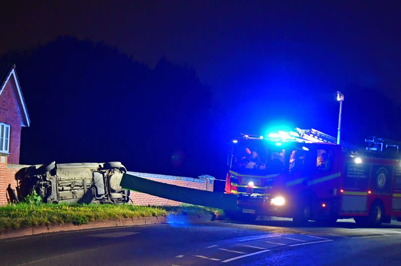 Overturned car scene on Caldway Drive, Netherley, Liverpool.