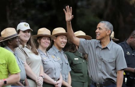 U.S. President Barack Obama waves to well wishers as he greets park rangers at Yosemite National Park, California, U.S., June 17, 2016. REUTERS/Joshua Roberts