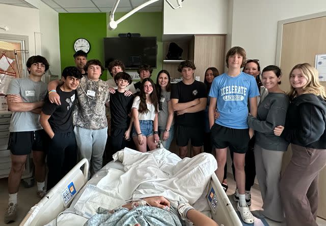 <p>Courtesy of the McDowell family</p> Jase surrounded by friends in the hospital