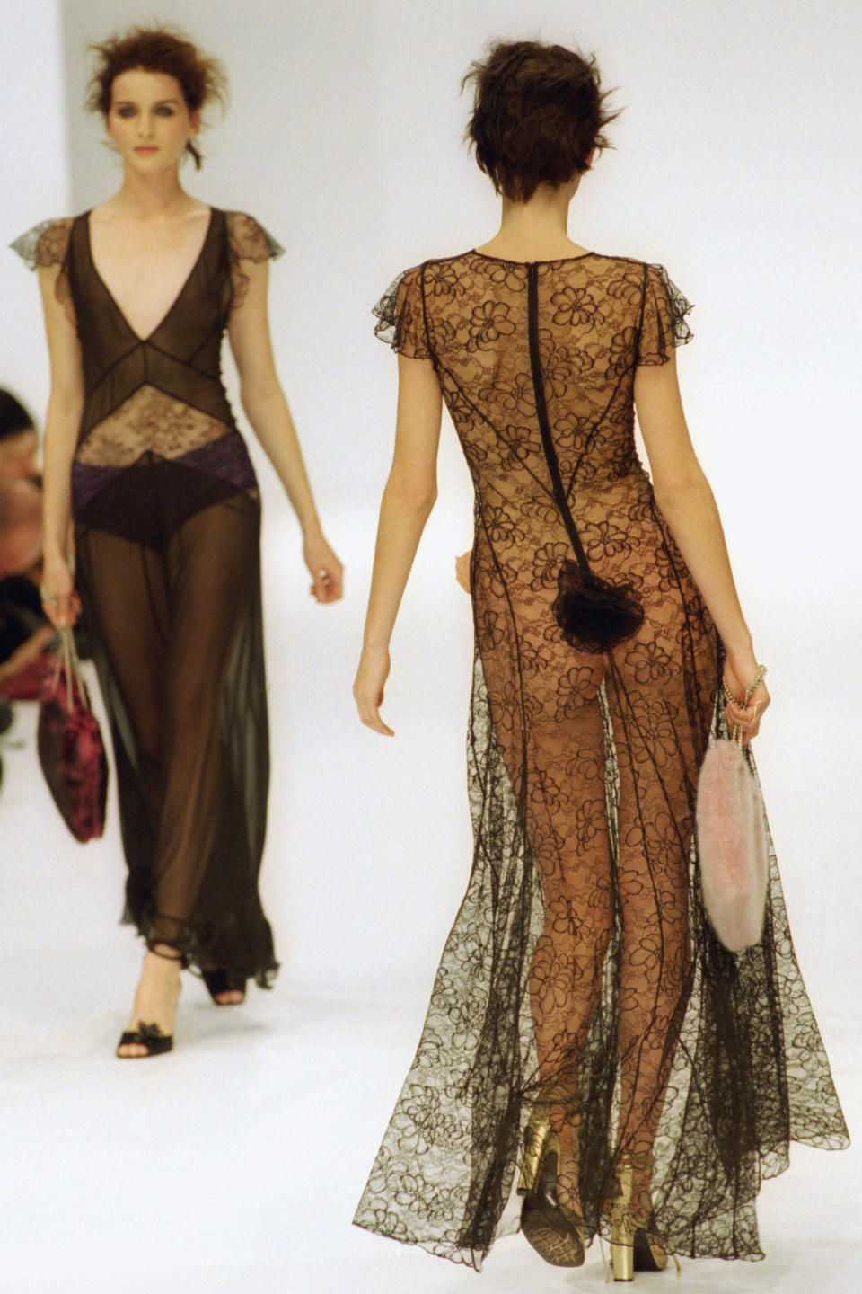 <p>As Paris Fashion Week is underway, we're taking a look at what the runways looked like 20 years ago. Does fashion, like history, really repeat itself? From the see-through lace dresses to sexy suiting and evening gowns with drama—it would appear that yes it most certainly does. </p>