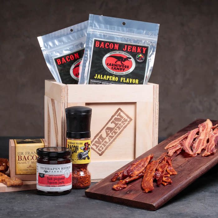 <p><strong>Man Crates</strong></p><p>mancrates.com</p><p><strong>$69.99</strong></p><p>Calling all meat lovers! This bacon crate is their dream come true. Your dad will enjoy munching on the flavor-packed bacon jerky, along with salty-sweet brittle and hot pepper jam.</p>