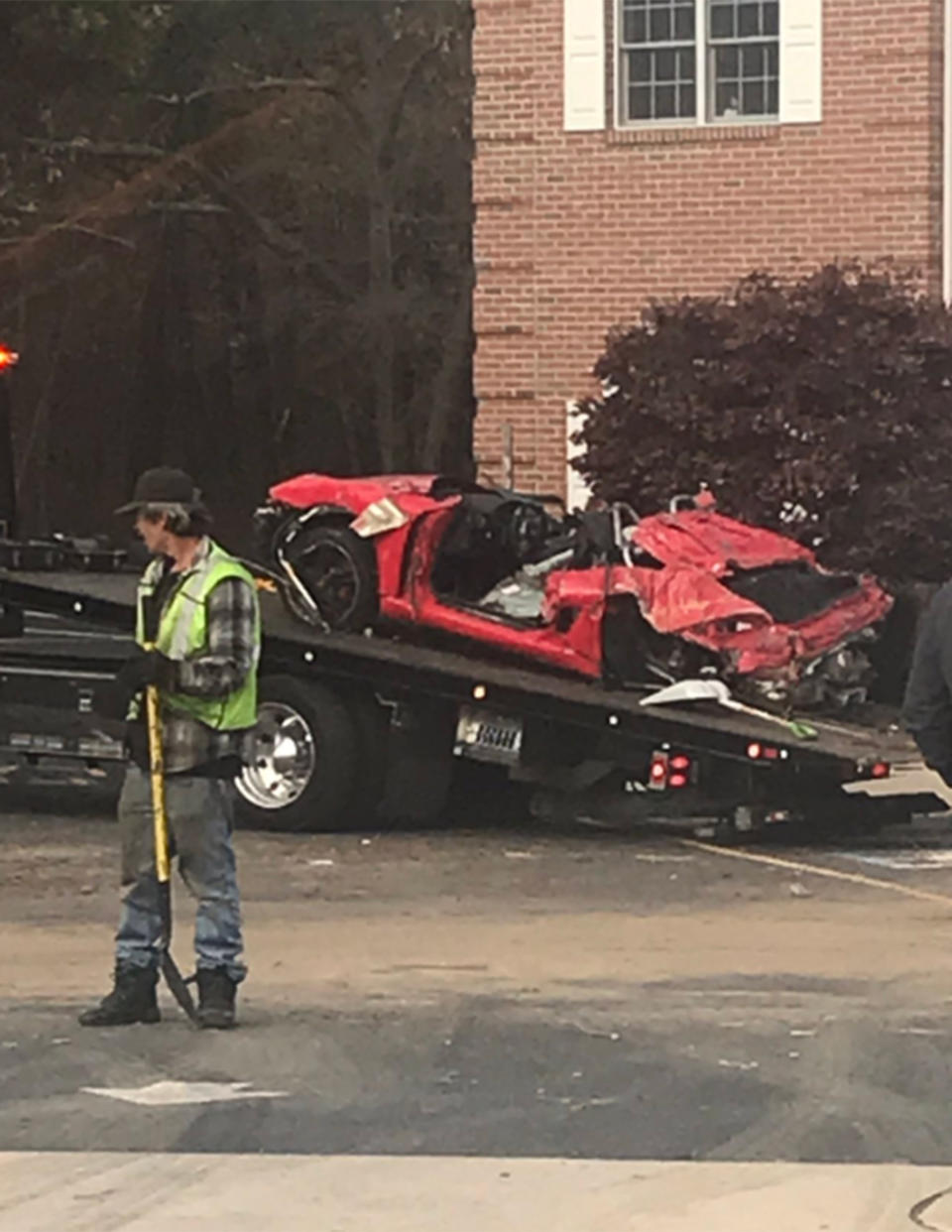 the crumbled red Porsche boxer after the crash that killed two men