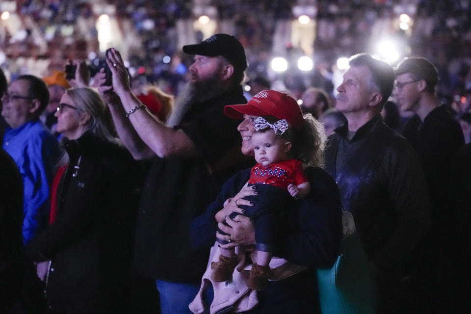 Supporters listen as Republican presidential candidate former President Donald Trump speaks at the National Rifle Association's Presidential Forum in Harrisburg, Pa., Friday, Feb. 9, 2024. (AP Photo/Matt Rourke)