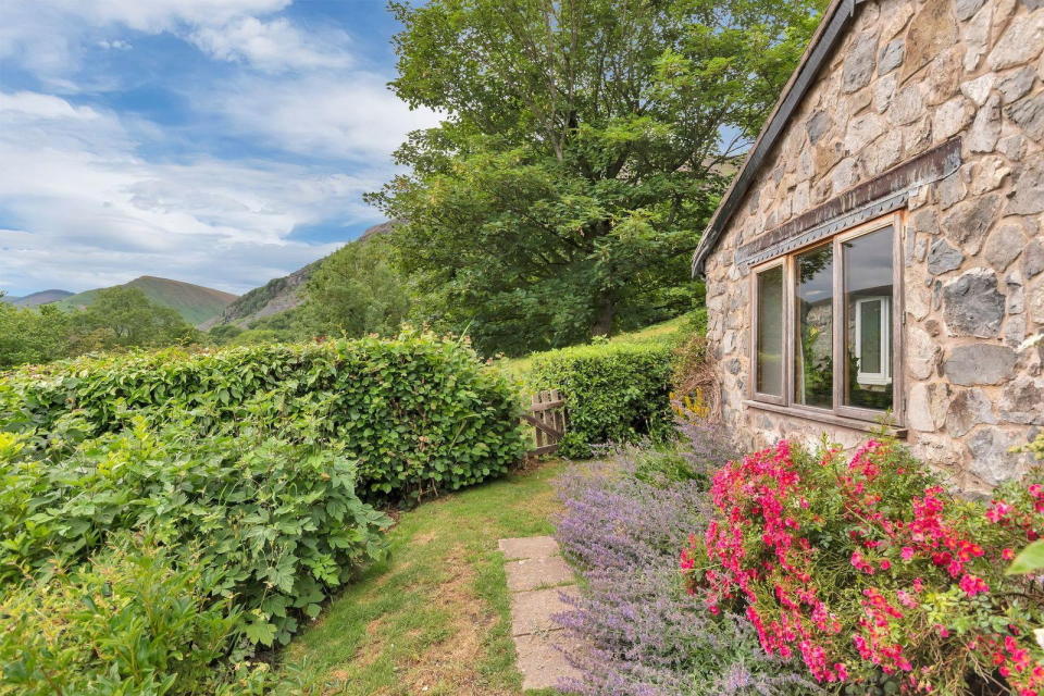 A spacious garden room, and a stable block are part of the £500,000 cottage. (SWNS)