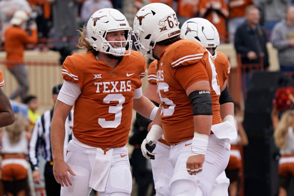 Texas quarterback Quinn Ewers (3) celebrates after scoring touchdown against Baylor during their 2022 game at Darrell K Royal-Texas Memorial Stadium.