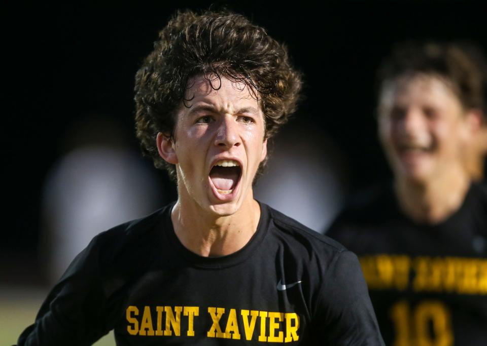 St. X's Stone Work celebrates his and the Tigers' first goal over visiting Trinity Wednesday night. Sept. 21, 2022