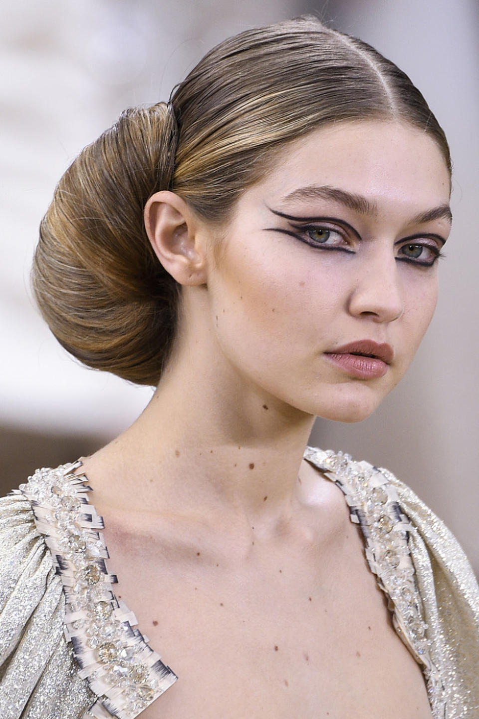 <p>Hadid rocks a hair roll at the Chanel spring 2016 couture runway show.</p>