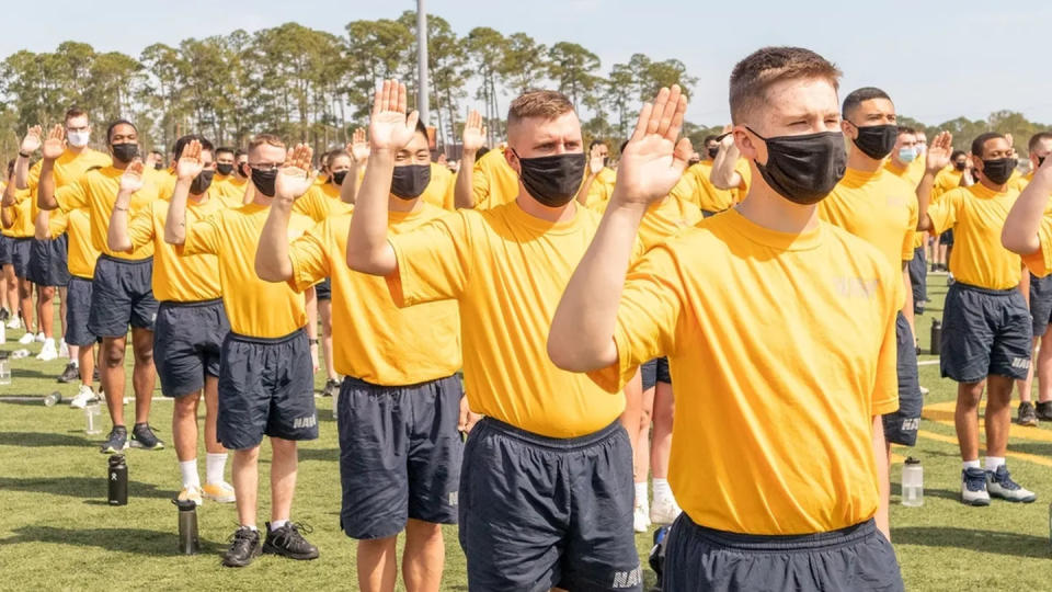 Students assigned to Information Warfare Training Command Corry Station in Pensacola, Fla., recite their oath of enlistment on March 12, 2021, during a stand-down addressing extremism in the ranks. (U.S. Navy photo by Chief Cryptologic Technician Collection Tyrell Ferguson-Bey)