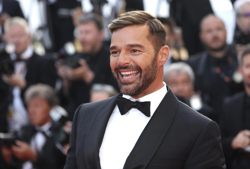 Ricky Martin poses for photographers upon arrival at the premiere of the film 'Elvis' at the 75th international film festival, Cannes, southern France, Wednesday, May 25, 2022. (Photo by Vianney Le Caer/Invision/AP)