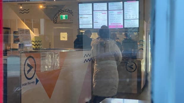 Customers order food at Güd Eats in Regina on Feb. 23, 2021.