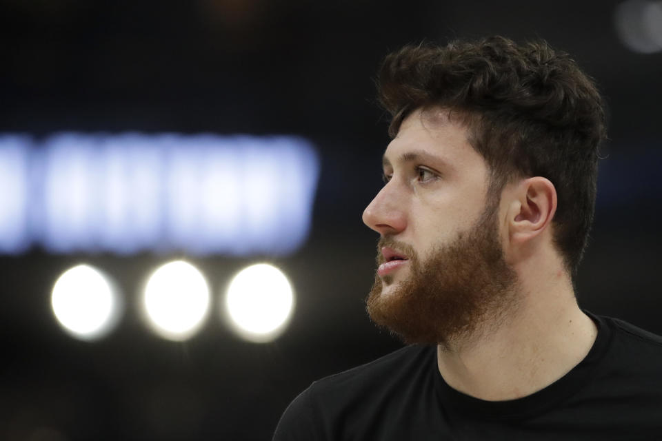 Portland Trail Blazers' Jusuf Nurkic warms up before an NBA basketball game against the Milwaukee Bucks Monday, Feb. 14, 2022, in Milwaukee. (AP Photo/Aaron Gash)