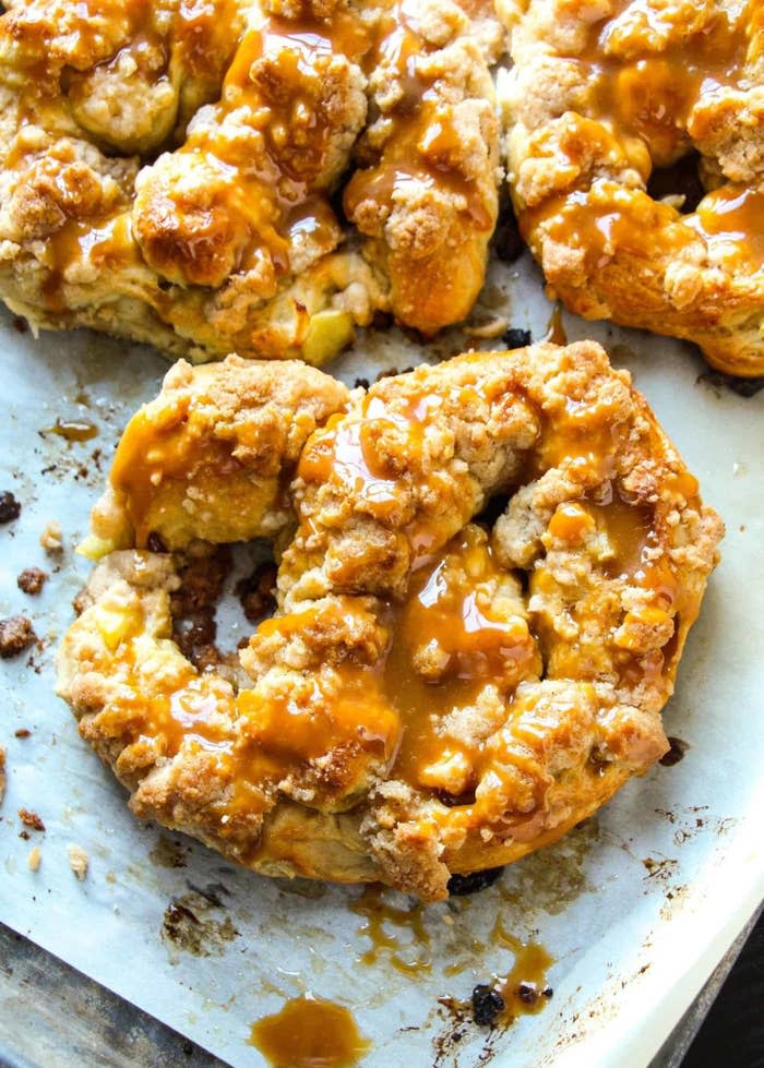 Everything you love about apple pie but in a pretzel. Dunked in salted caramel. Recipe here.