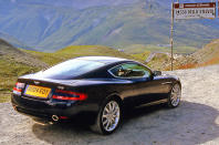 <p><span><span>Visually, the DB9 appeared to be an update of the DB7, and it shared the earlier car’s </span><span>V12</span><span> engine, though with a power upgrade to </span><span>450bhp</span><span>. Its structure, however, was completely new. This was the first car based on the new VH platform, which Aston said made its bodyshell </span><span>25 percent lighter yet twice as torsionally stiff</span><span> as that of its predecessor.</span></span></p><p><span><span>The DB9 was also the first car built in Aston Martin’s new factory in Gaydon, Warwickshire, where it remained in production all the way from 2004 to 2016.</span></span></p> 